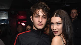 Bella Hadid Steps Out in '90s-Inspired Denim Dress With Brother Anwar