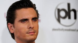 Scott Disick Snapped Cuddling With Bikini-Clad Blonde in Miami