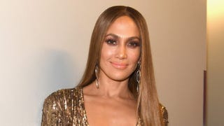 Jennifer Lopez Flashes Major Cleavage in Bedazzled Prayer Hands Bodysuit