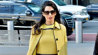Pregnant Amal Clooney Stuns in Yellow While Working in NYC!