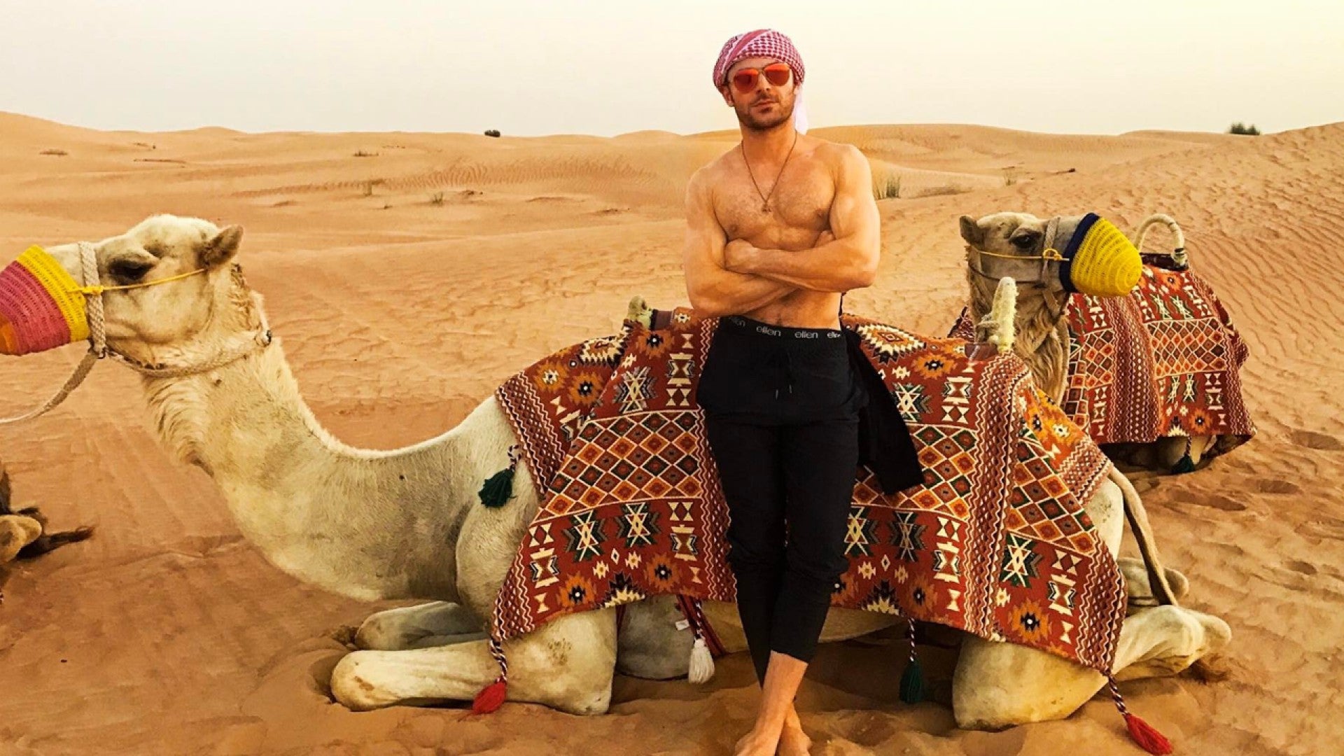 Zac Efron Rides A Camel Shirtless In Dubai See The Smoldering
