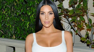 Kim Kardashian Has a Fashion Emergency in a Tiny Bra Top