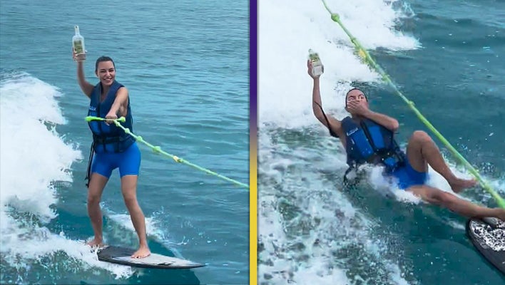 Kim Kardashian Clutches Tequila Bottle as She Wipes Out on Wakeboard