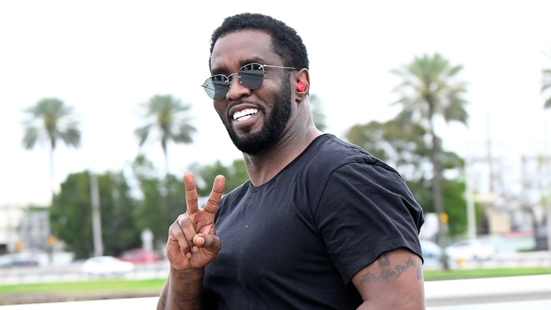 Diddy All Smiles as Federal Investigation Continues After Home Raid