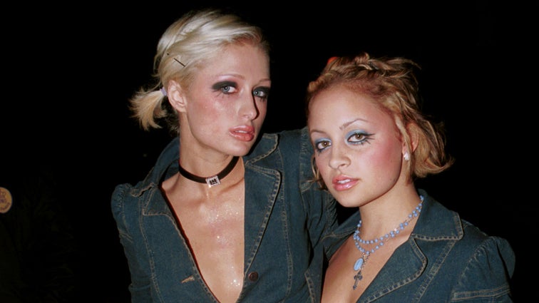 Paris Hilton poses with Nicole Richie outside The Lounge club Nov. 29, 2001 in West Hollywood, CA. 